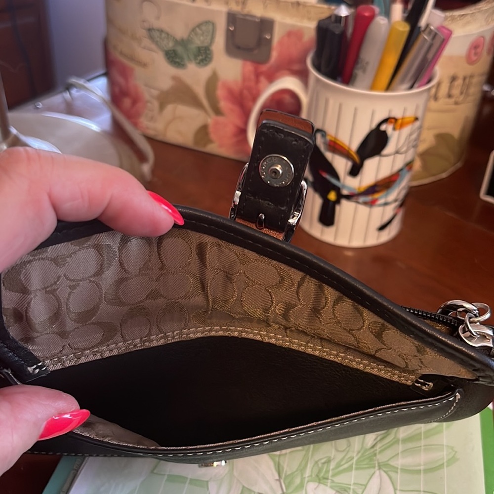 Coach wristlet, black with zipper on top.  7 1/2 by 4 1/2 “. Very clean. - Picture 4 of 4